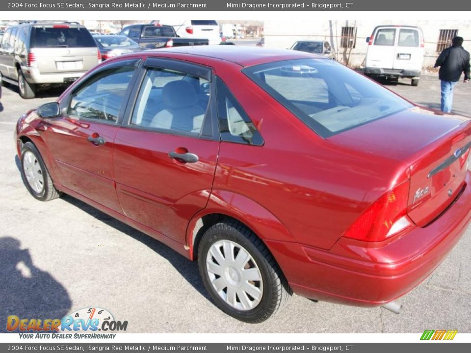 2004 Ford Focus SE Sedan Sangria Red Metallic / Medium Parchment Photo #6