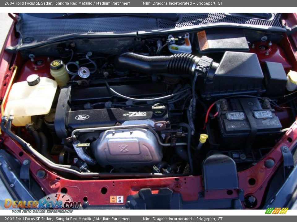 2004 Ford Focus SE Sedan Sangria Red Metallic / Medium Parchment Photo #20