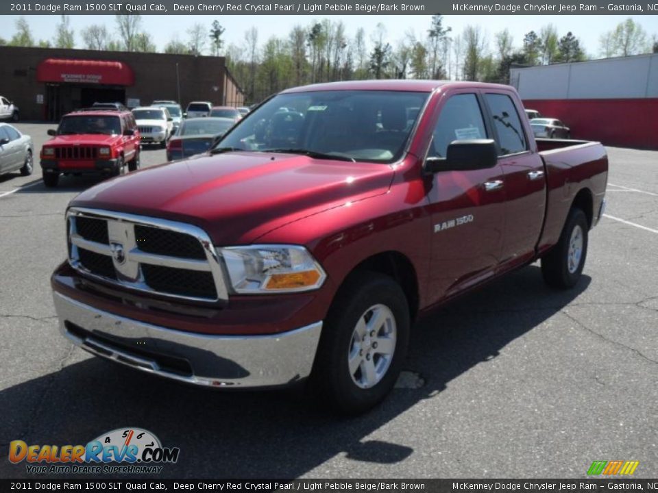 Front 3/4 View of 2011 Dodge Ram 1500 SLT Quad Cab Photo #1