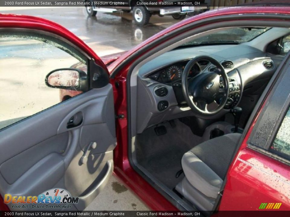 2003 Ford Focus LX Sedan Sangria Red Metallic / Medium Graphite Photo #8