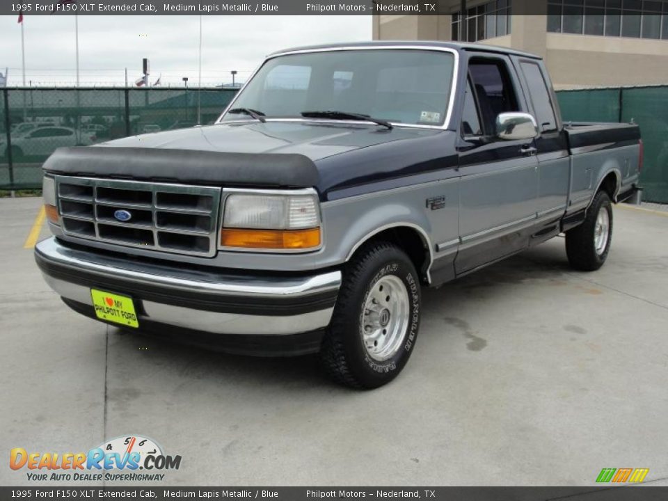 Front 3/4 View of 1995 Ford F150 XLT Extended Cab Photo #7
