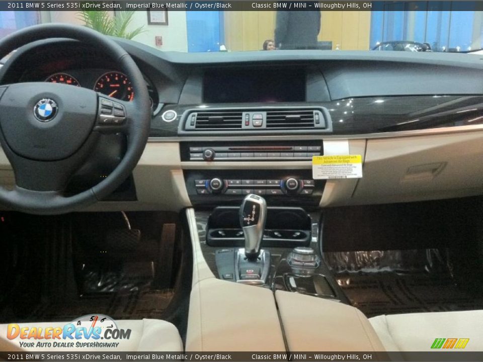 Dashboard of 2011 BMW 5 Series 535i xDrive Sedan Photo #10