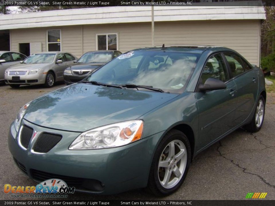Front 3/4 View of 2009 Pontiac G6 V6 Sedan Photo #8
