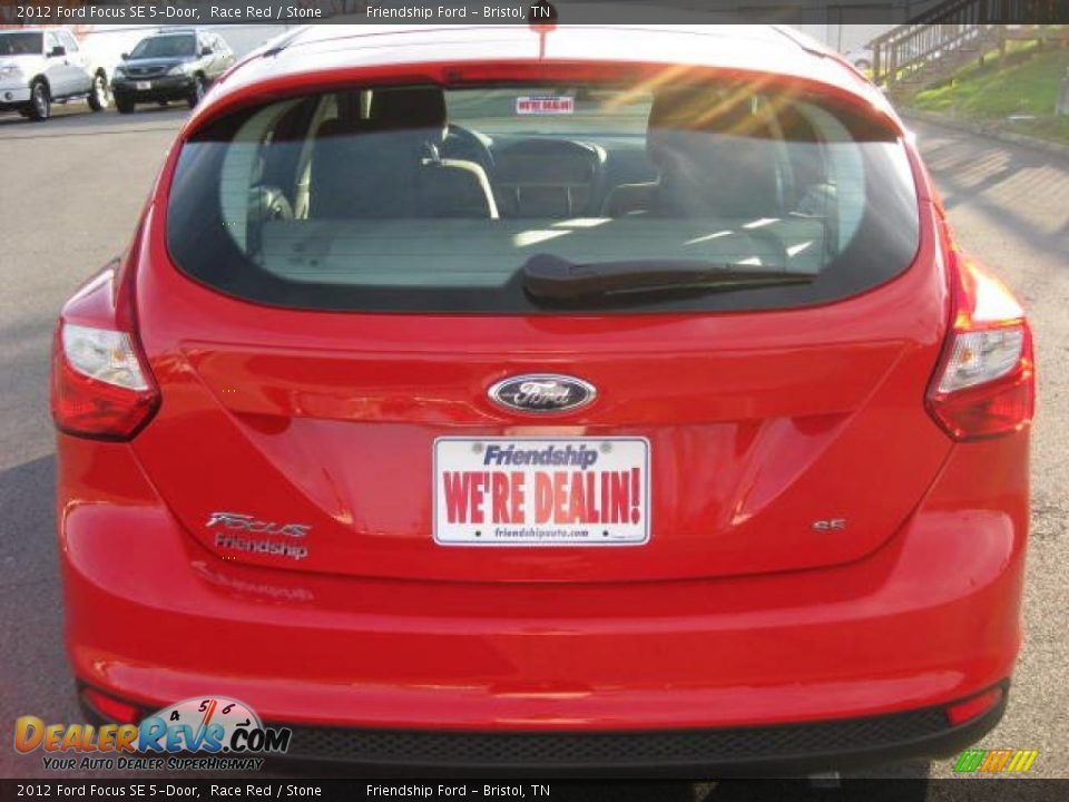 2012 Ford Focus SE 5-Door Race Red / Stone Photo #5