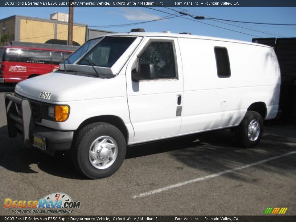 Front 3/4 View of 2003 Ford E Series Van E350 Super Duty Armored Vehicle Photo #5