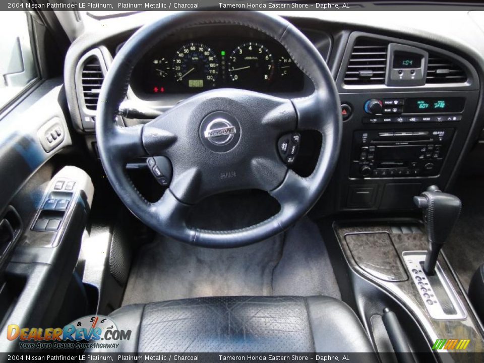 Dashboard of 2004 Nissan Pathfinder LE Platinum Photo #20