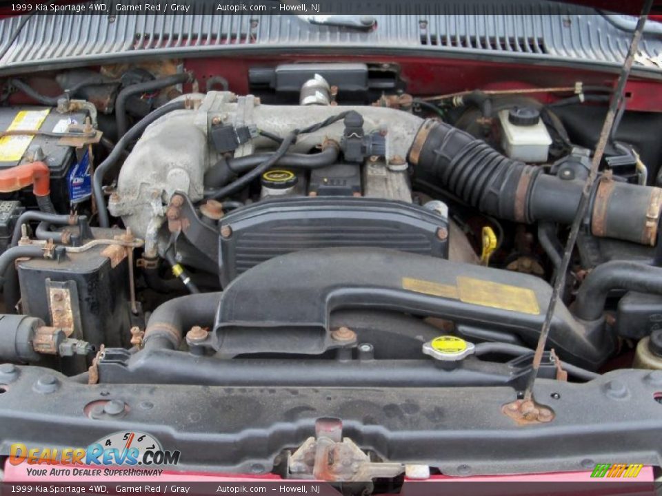 1999 Kia Sportage 4WD Garnet Red / Gray Photo #16