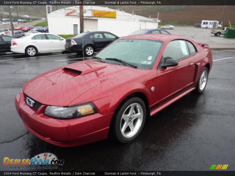 Front 3/4 View of 2004 Ford Mustang GT Coupe Photo #5