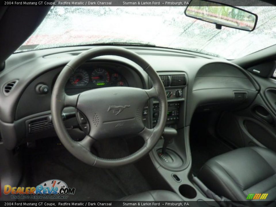 Dashboard of 2004 Ford Mustang GT Coupe Photo #10