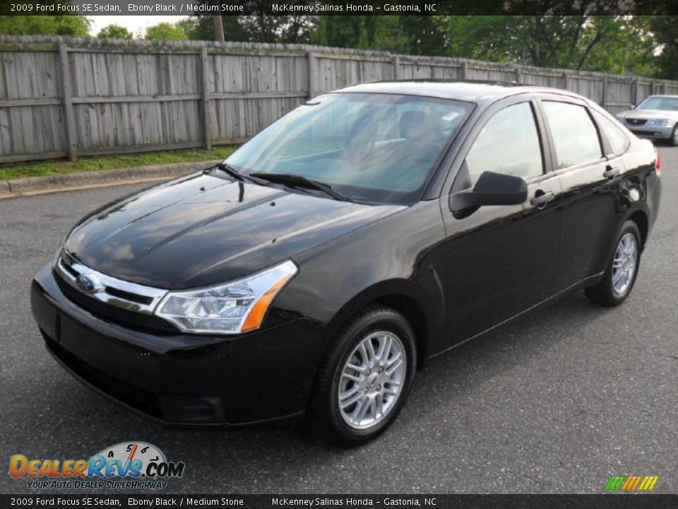 2009 Ford Focus SE Sedan Ebony Black / Medium Stone Photo #1