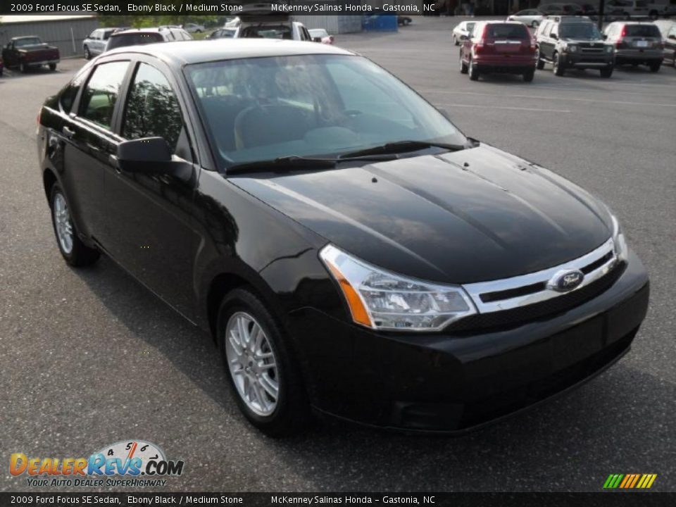 2009 Ford Focus SE Sedan Ebony Black / Medium Stone Photo #5