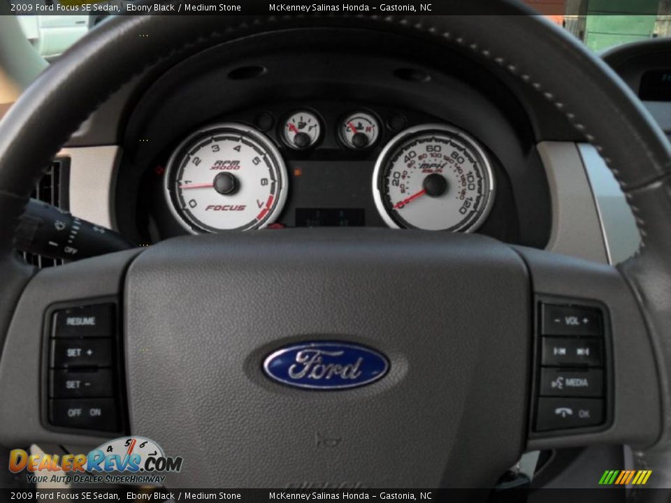2009 Ford Focus SE Sedan Ebony Black / Medium Stone Photo #15