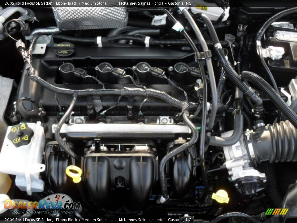 2009 Ford Focus SE Sedan Ebony Black / Medium Stone Photo #31