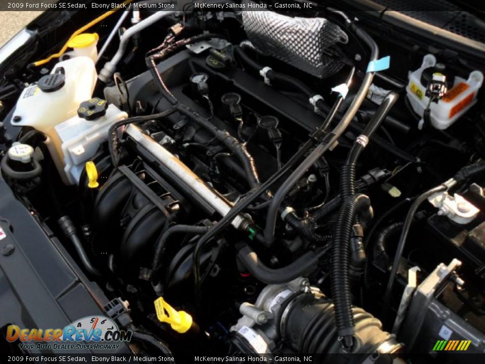 2009 Ford Focus SE Sedan Ebony Black / Medium Stone Photo #32
