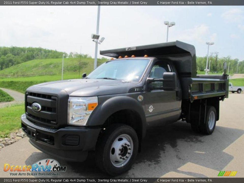 Front 3/4 View of 2011 Ford F550 Super Duty XL Regular Cab 4x4 Dump Truck Photo #7