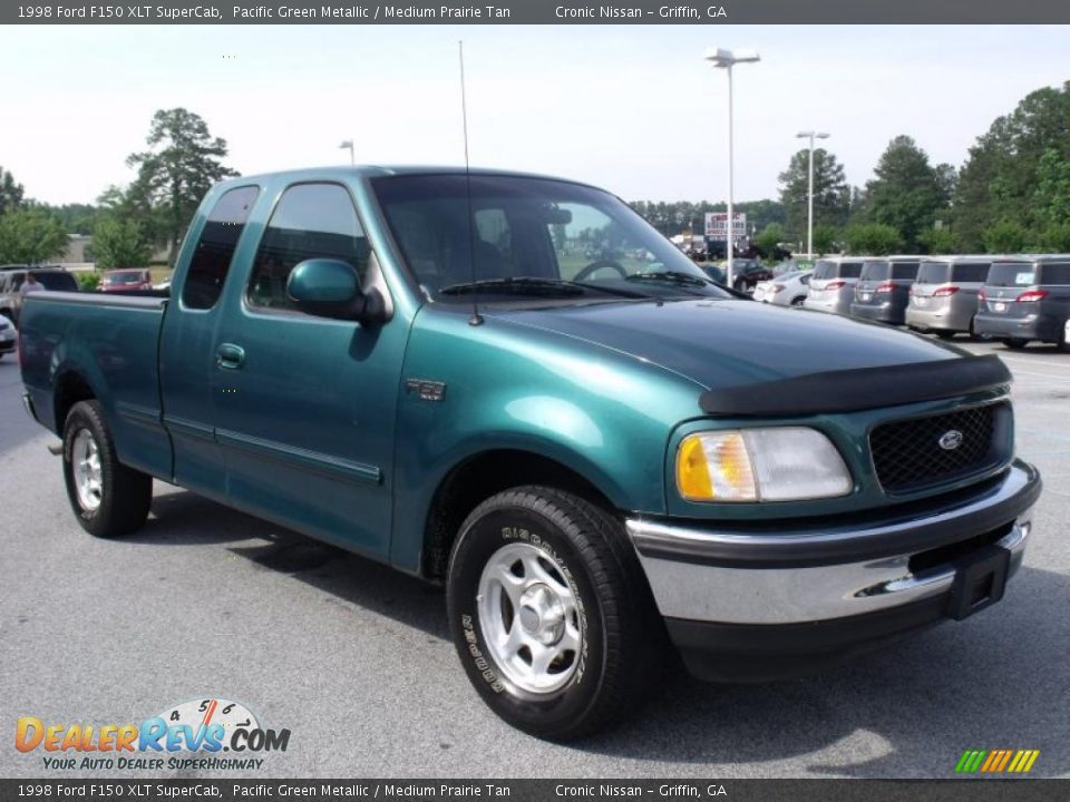 Front 3/4 View of 1998 Ford F150 XLT SuperCab Photo #7