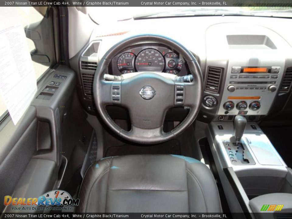 Dashboard of 2007 Nissan Titan LE Crew Cab 4x4 Photo #9