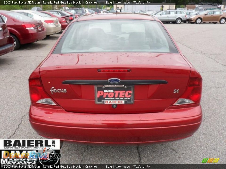 2003 Ford Focus SE Sedan Sangria Red Metallic / Medium Graphite Photo #4