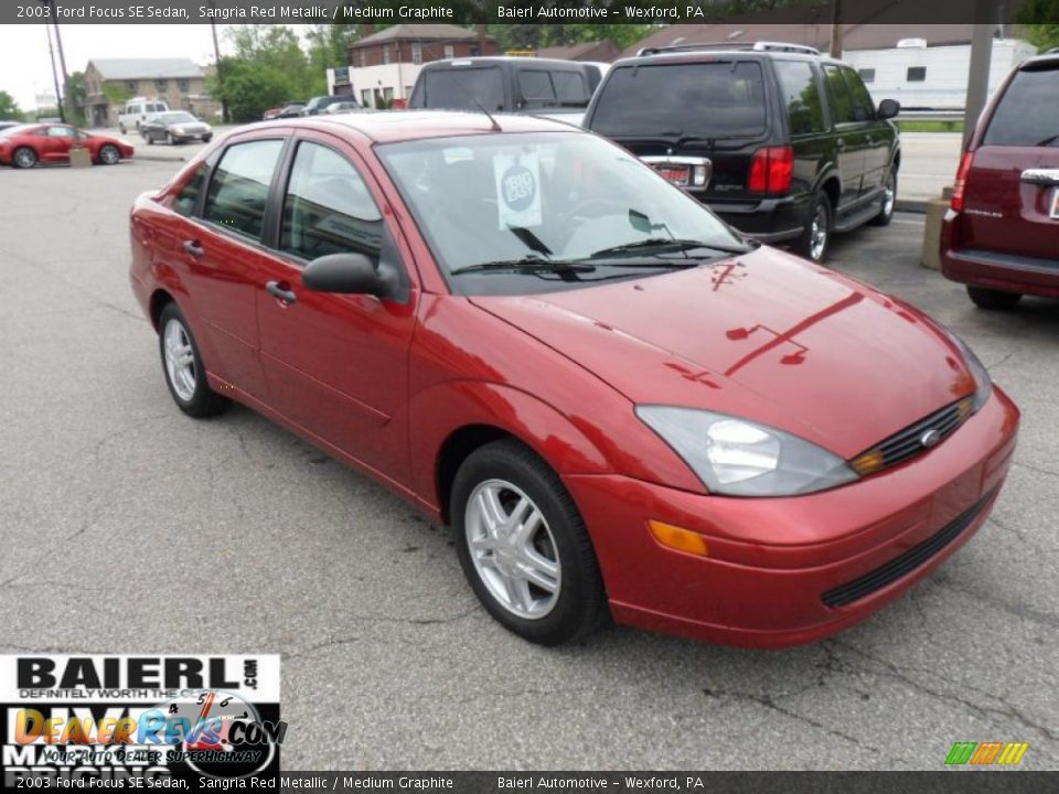 2003 Ford Focus SE Sedan Sangria Red Metallic / Medium Graphite Photo #7