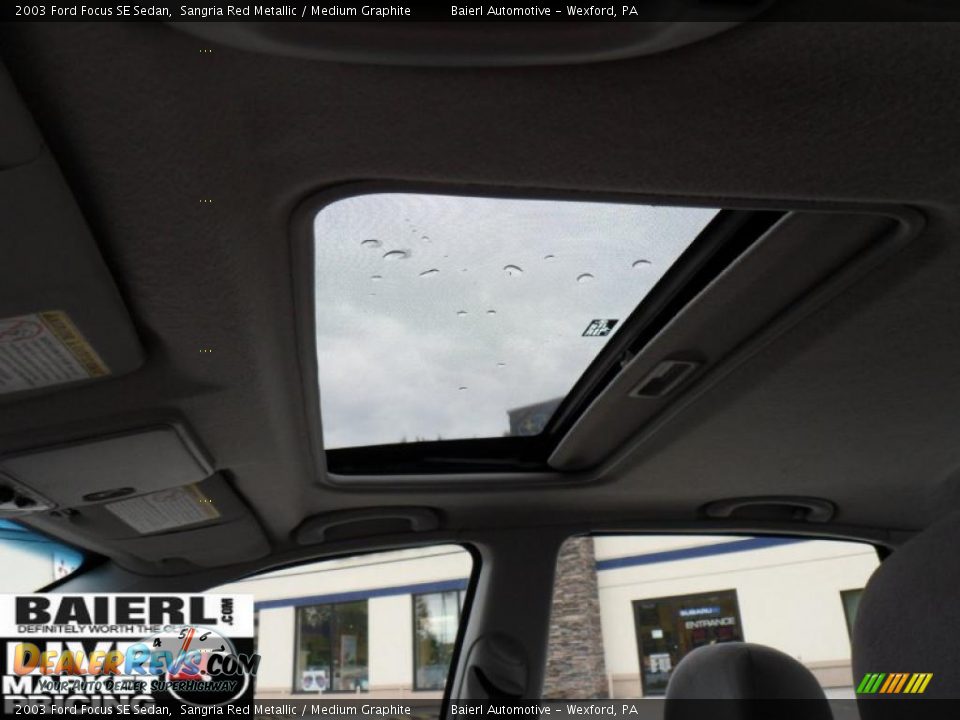 2003 Ford Focus SE Sedan Sangria Red Metallic / Medium Graphite Photo #13