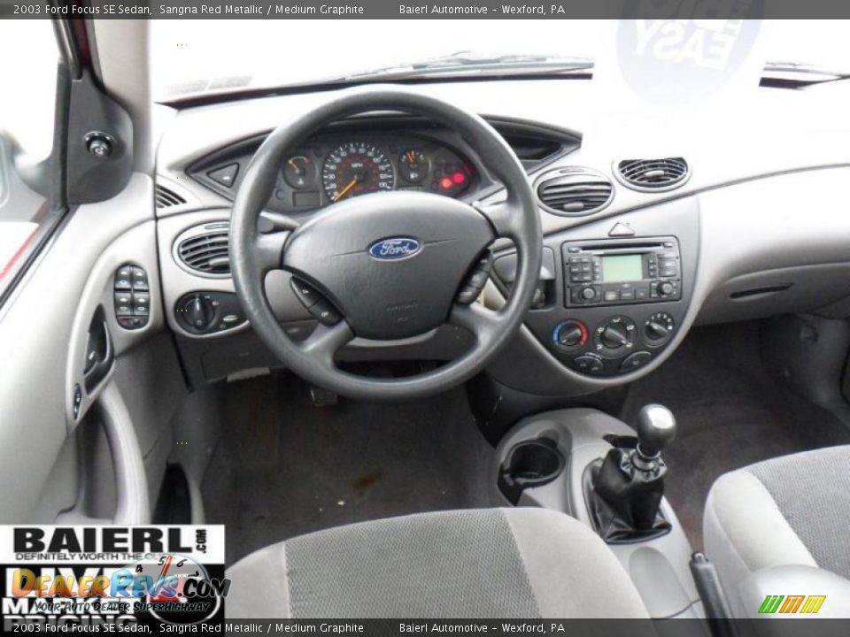 2003 Ford Focus SE Sedan Sangria Red Metallic / Medium Graphite Photo #15
