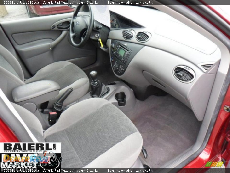 2003 Ford Focus SE Sedan Sangria Red Metallic / Medium Graphite Photo #18