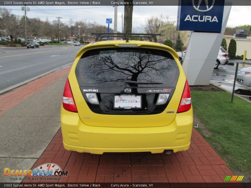 2003 Suzuki Aerio SX AWD Sport Wagon Electric Yellow / Black Photo #6