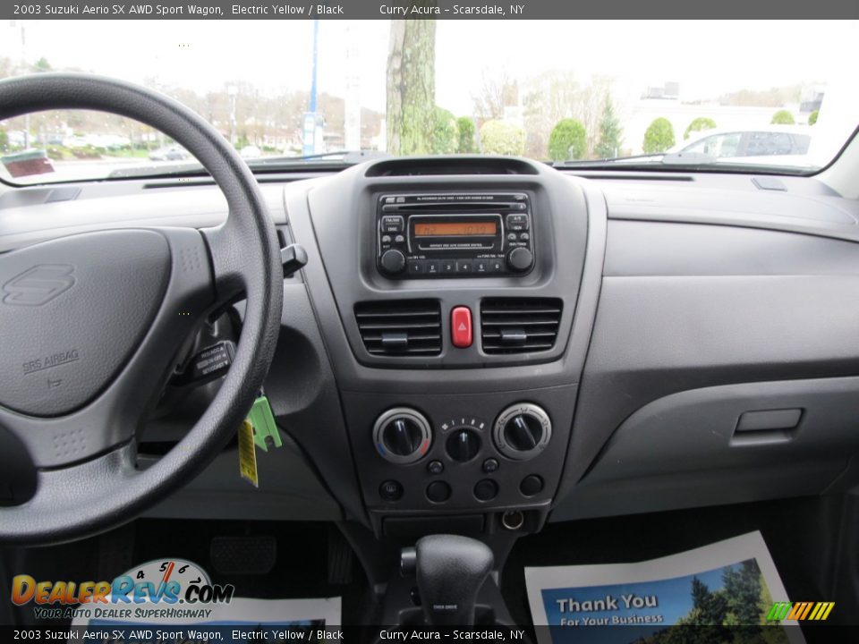 Dashboard of 2003 Suzuki Aerio SX AWD Sport Wagon Photo #15