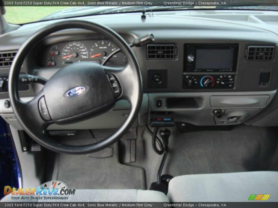 Dashboard of 2003 Ford F250 Super Duty FX4 Crew Cab 4x4 Photo #9