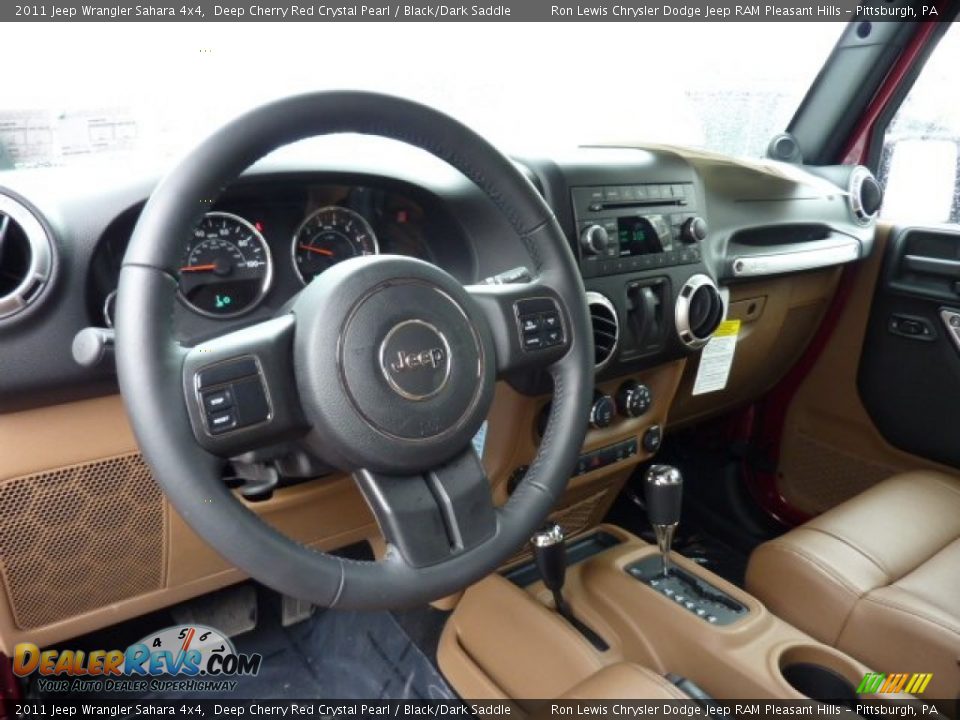 Dashboard of 2011 Jeep Wrangler Sahara 4x4 Photo #19