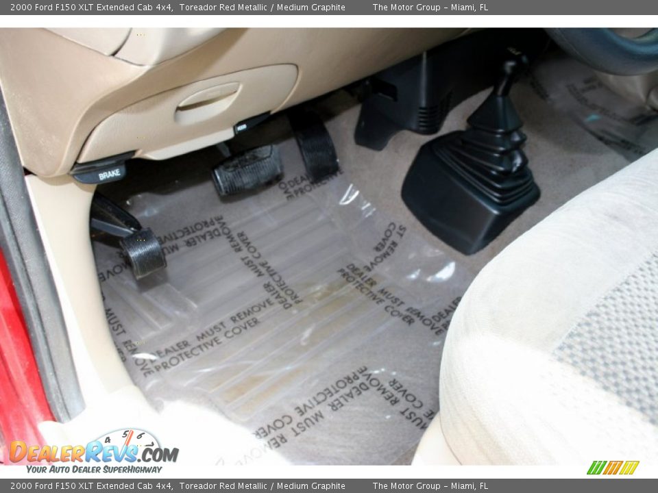 2000 Ford F150 XLT Extended Cab 4x4 Toreador Red Metallic / Medium Graphite Photo #32