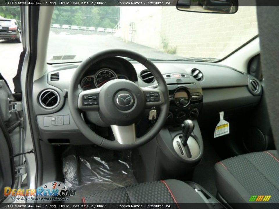 Dashboard of 2011 Mazda MAZDA2 Touring Photo #12