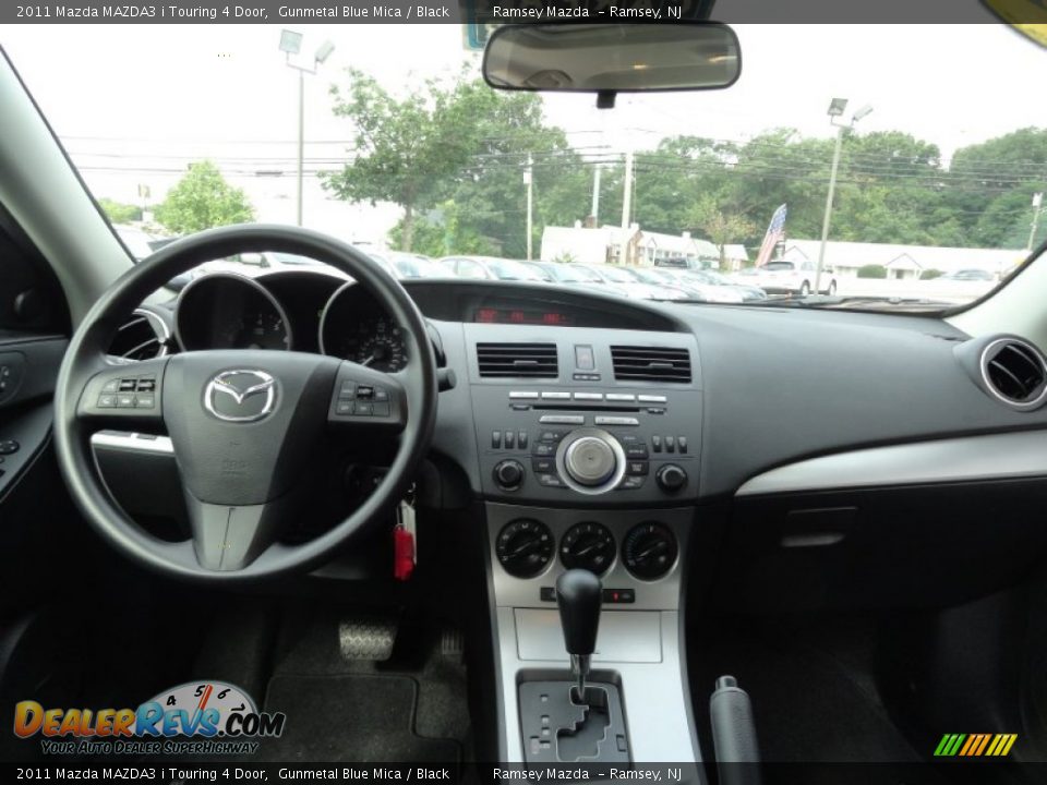 Dashboard of 2011 Mazda MAZDA3 i Touring 4 Door Photo #20