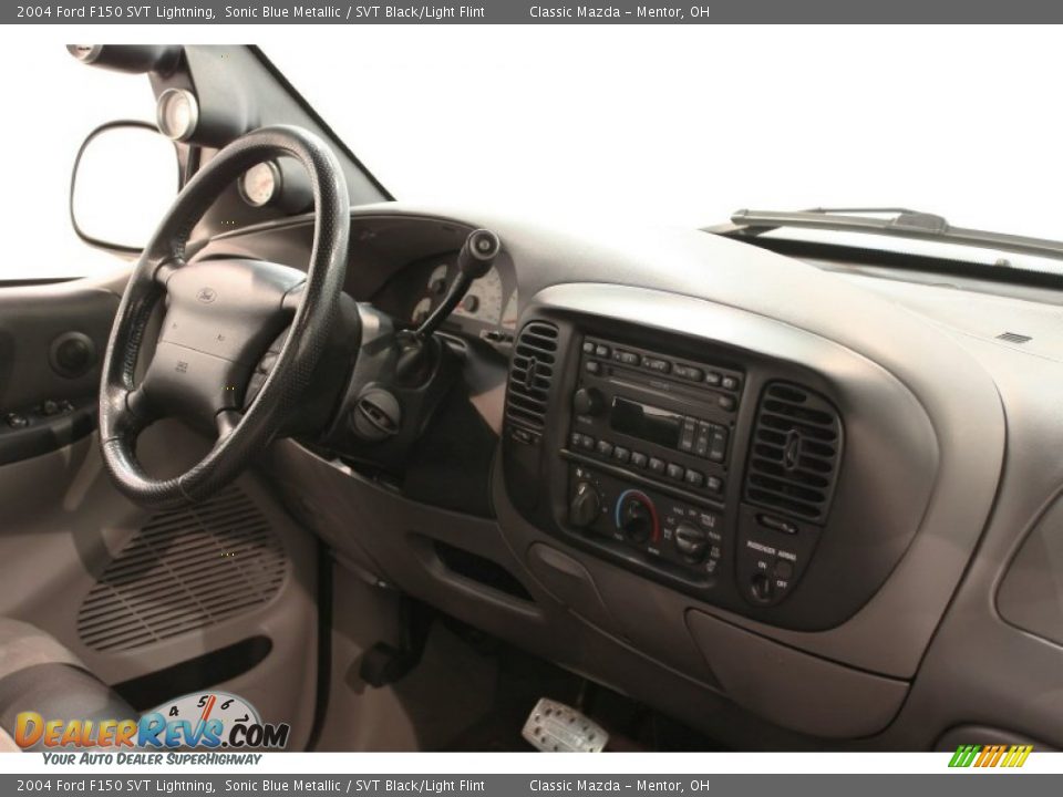 Dashboard of 2004 Ford F150 SVT Lightning Photo #21