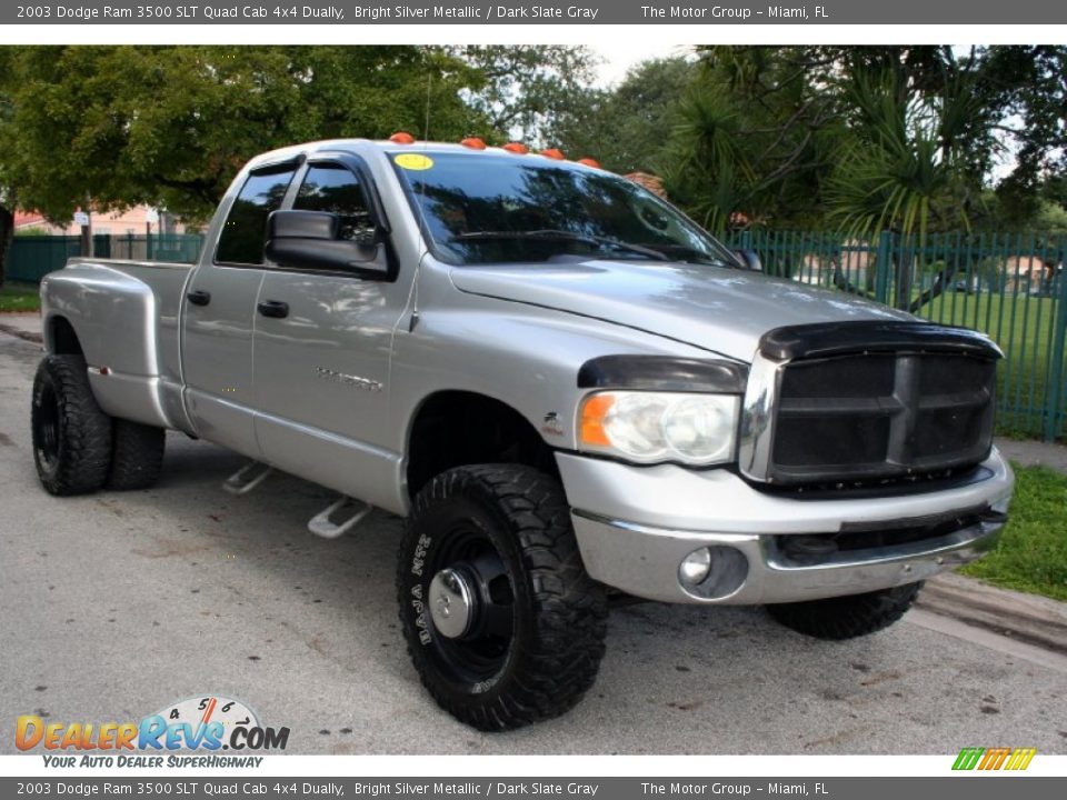 Front 3/4 View of 2003 Dodge Ram 3500 SLT Quad Cab 4x4 Dually Photo #16