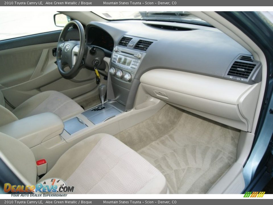 Dashboard of 2010 Toyota Camry LE Photo #12
