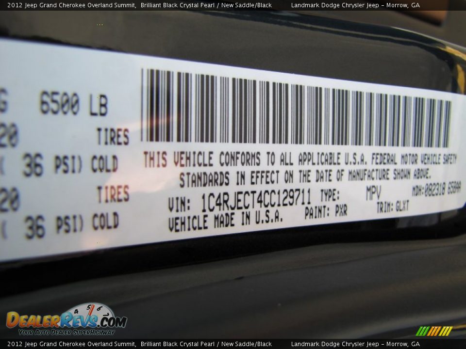 Front 3/4 View of 2012 Jeep Grand Cherokee Overland Summit Photo #16