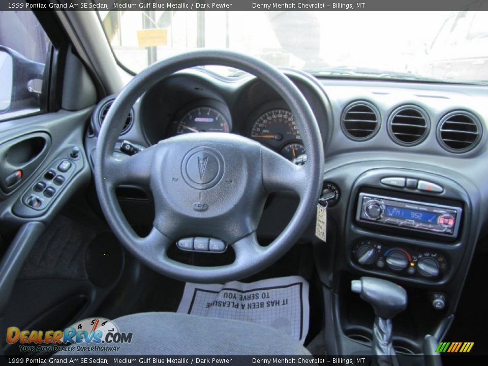 Dashboard of 1999 Pontiac Grand Am SE Sedan Photo #4