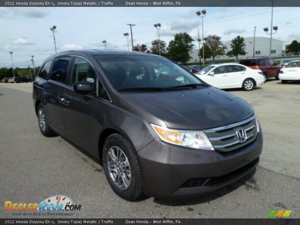Front 3/4 View of 2012 Honda Odyssey EX-L Photo #7