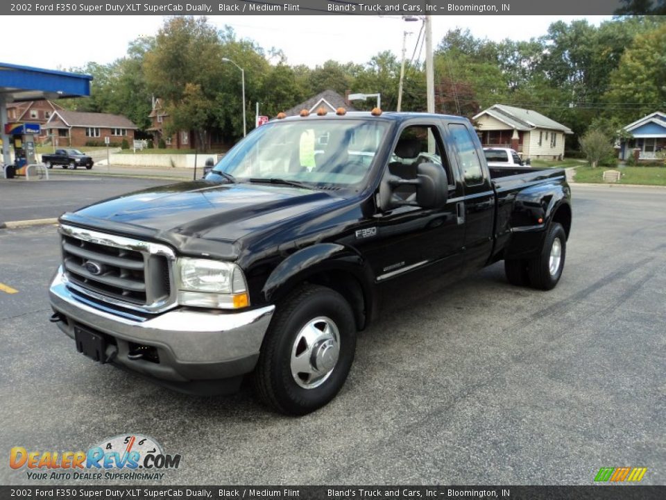 Front 3/4 View of 2002 Ford F350 Super Duty XLT SuperCab Dually Photo #2