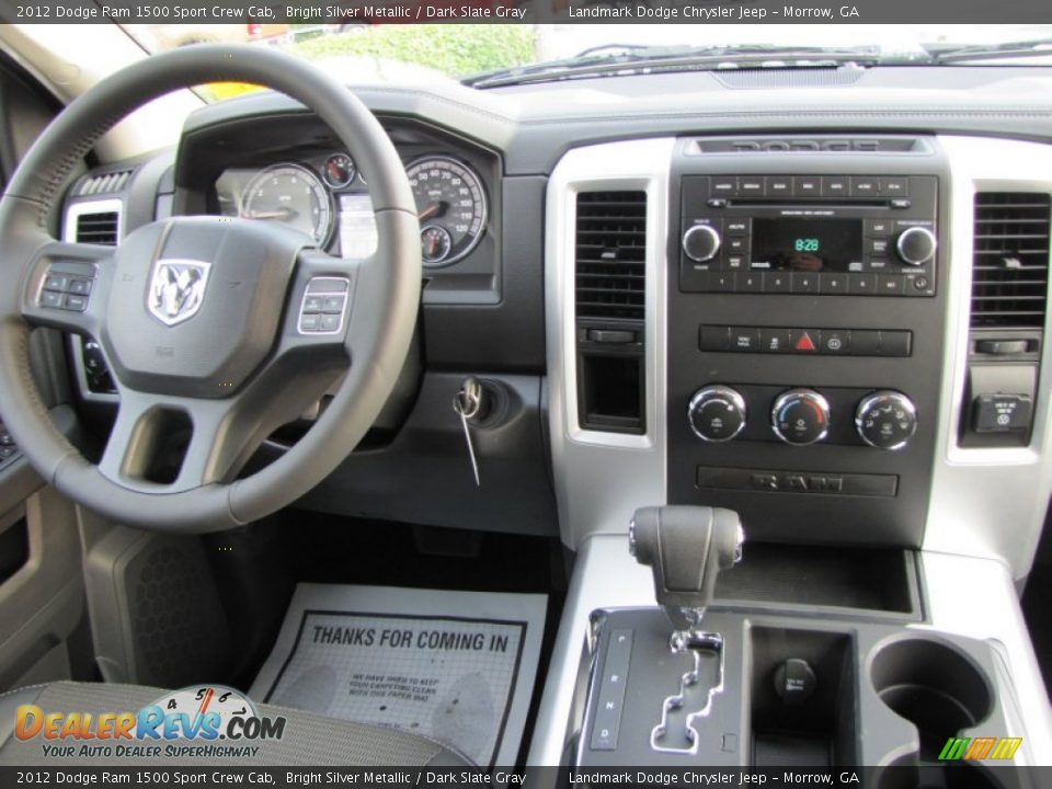 Dashboard of 2012 Dodge Ram 1500 Sport Crew Cab Photo #9