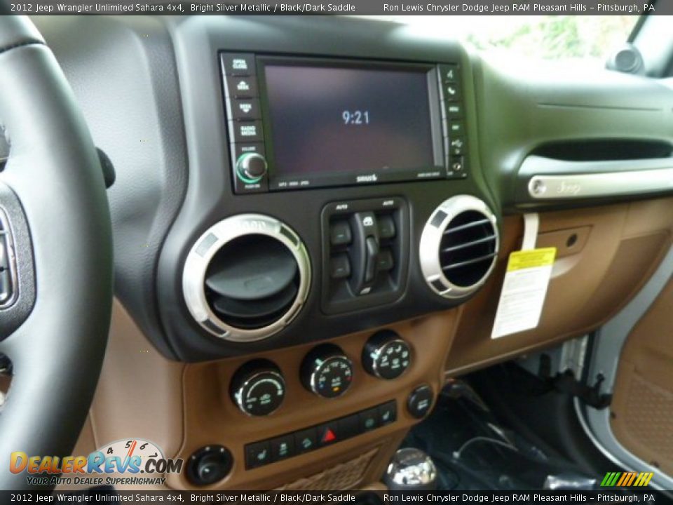 Dashboard of 2012 Jeep Wrangler Unlimited Sahara 4x4 Photo #23