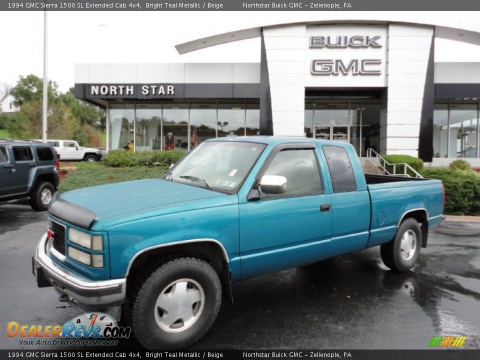 1994 GMC Sierra 1500 SL Extended Cab 4x4 Bright Teal Metallic / Beige Photo #1