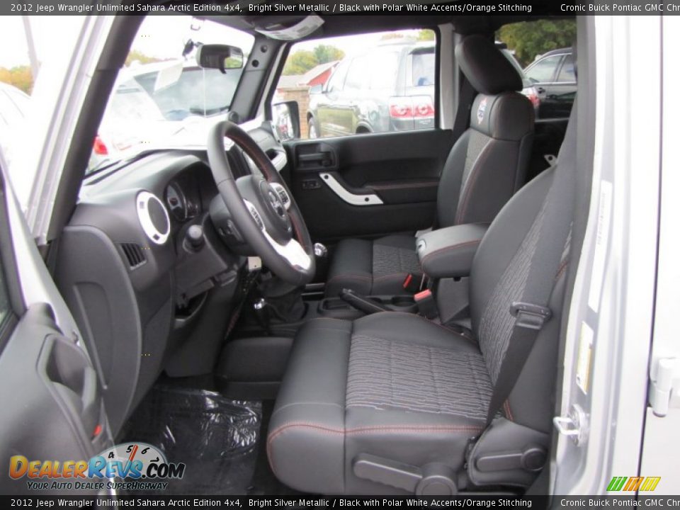 Black with Polar White Accents/Orange Stitching Interior - 2012 Jeep Wrangler Unlimited Sahara Arctic Edition 4x4 Photo #11
