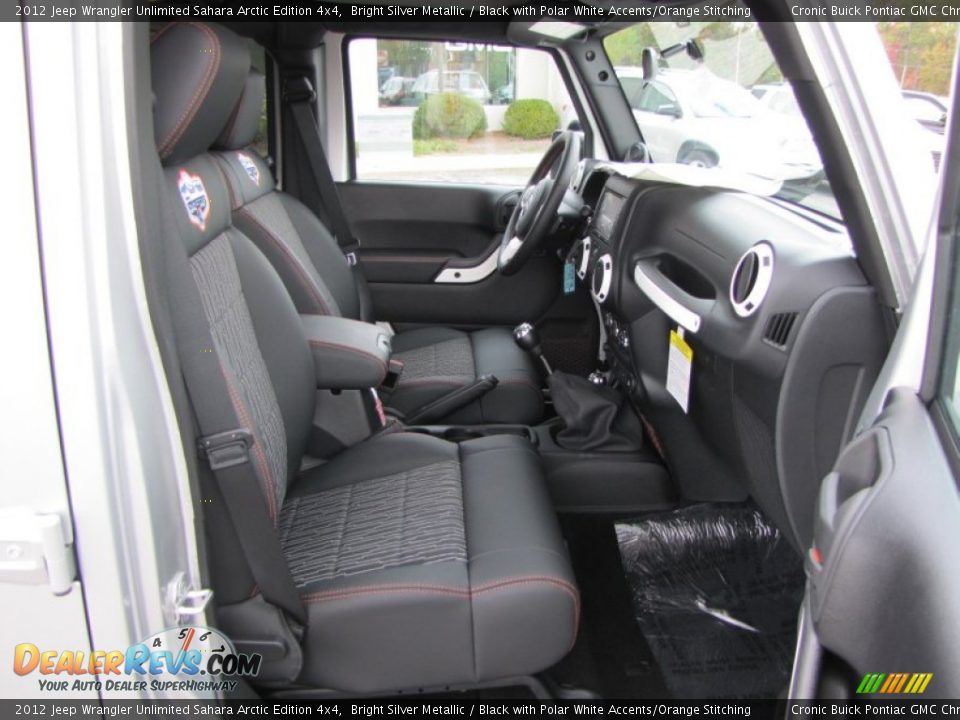 Black with Polar White Accents/Orange Stitching Interior - 2012 Jeep Wrangler Unlimited Sahara Arctic Edition 4x4 Photo #14
