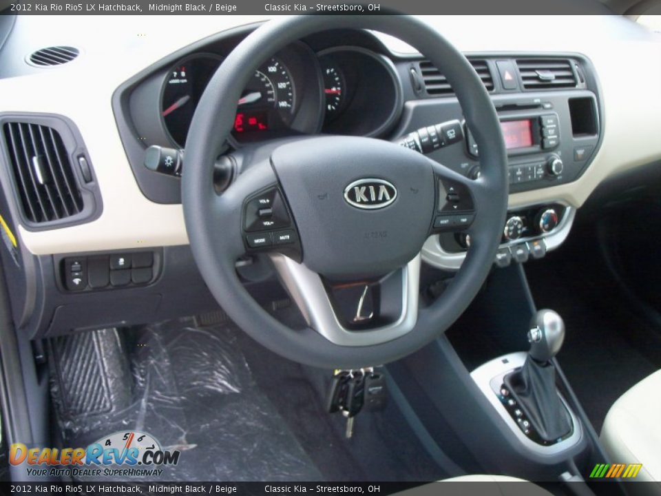 Dashboard of 2012 Kia Rio Rio5 LX Hatchback Photo #16