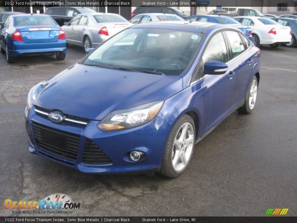 Front 3/4 View of 2012 Ford Focus Titanium Sedan Photo #1