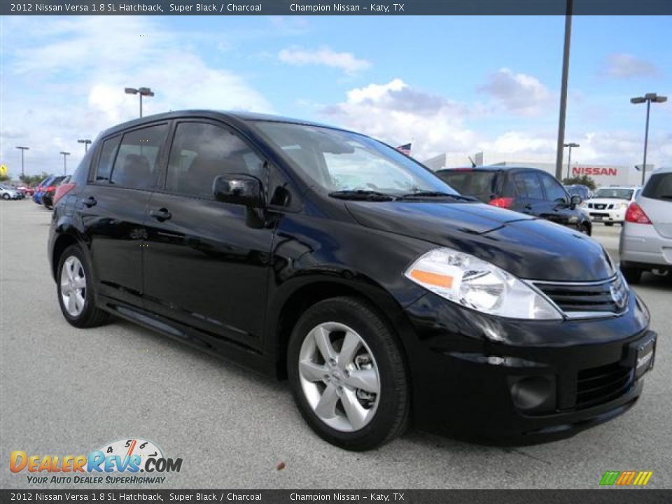 Black nissan versa hatchback #9