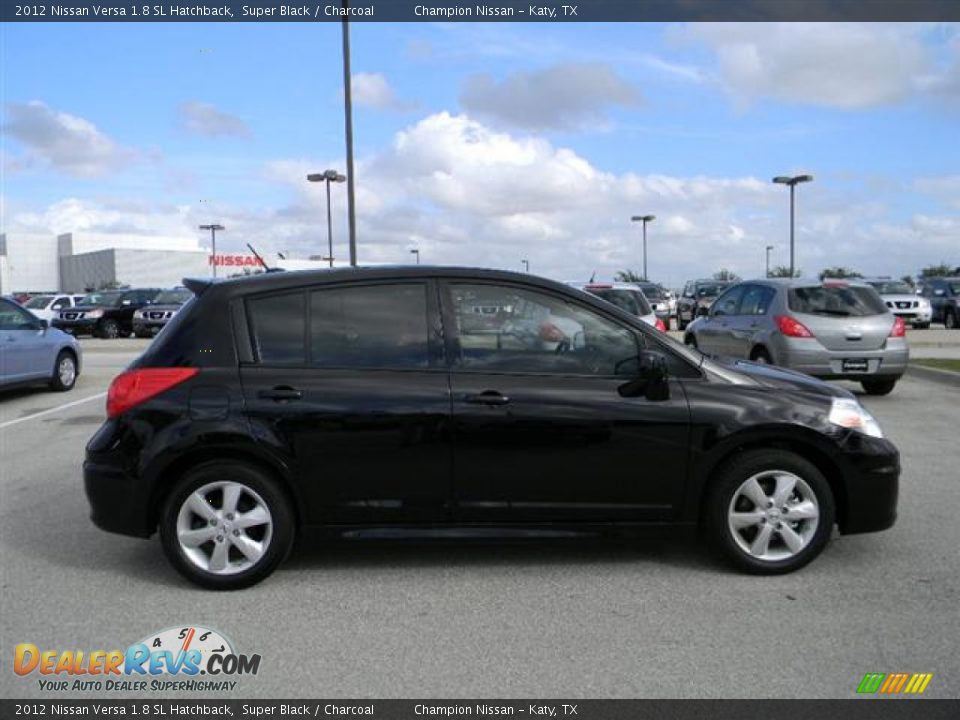 2012 Black nissan versa hatchback #8