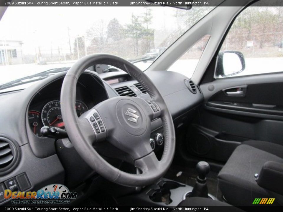 2009 Suzuki SX4 Touring Sport Sedan Vapor Blue Metallic / Black Photo #7